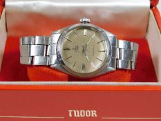 A gents vintage stainless steel Tudor Rolex wrist watch with box, running order, winder moves hands