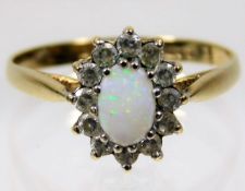 A 9ct gold opal & white stone ring 1.5g size N/O