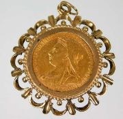 A Victorian 1901 gold sovereign with 9ct gold moun