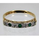 A 9ct gold emerald & diamond ring 1.8g size P