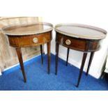 A pair of oval Regency style mahogany gallery tabl