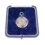 A silver shooting medal with enamelled decor award