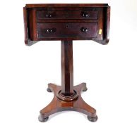 A 19thC. mahogany work table with two drawers