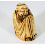 A c.1900 carved ivory Oriental man