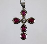 A 9ct white gold cross with chain set with ruby & diamond 4.9g