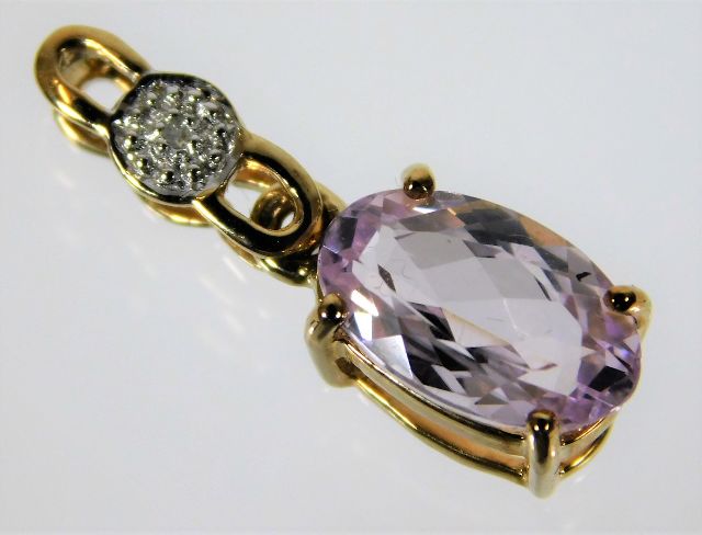 A 9ct diamond & kunzite pendant 1.3g