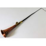An H & S London combined copper hunting horn & whip 29in excluding tassel