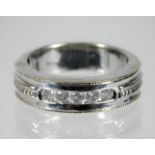 A 9ct white gold ring set with five diamonds of approx. 0.35ct 5.6g size N/O