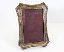 A silver photo frame 6.875in high