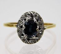 An 18ct gold sapphire & diamond ring 2.9g size Q