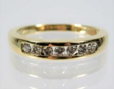 A yellow metal ring, tests as 9ct gold, set with a