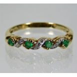 A 9ct gold emerald & diamond ring 2g size Q