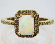 A 14ct gold diamond & opal ring 5g size O