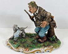 A Capodimonte figure group depicting huntsman with
