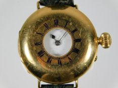 An 18ct gold wrist watch, maker Smith & Son Ltd. L