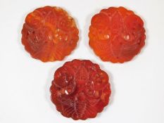 Three carved Chinese carnelian amulets approx. 55m