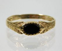 A 9ct gold ring set with onyx 1.3g size O
