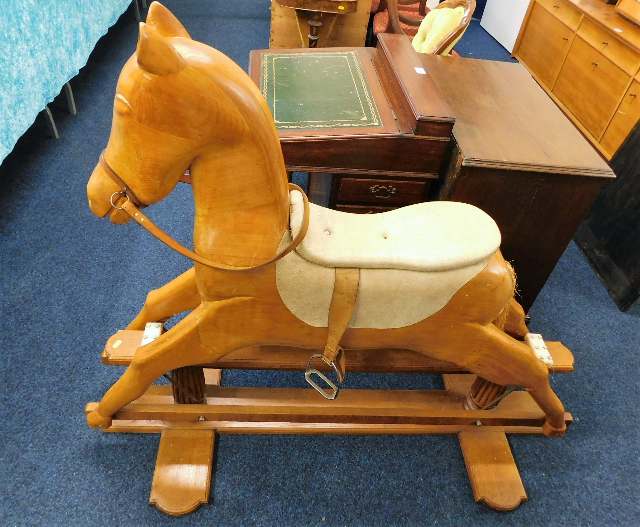 A 20thC. childs pine rocking horse 44.5in H x 55in