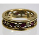 A 9ct gold eternity ring set with diamond & ruby 4