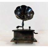 A silver plated musical box in form of gramophone