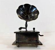 A silver plated musical box in form of gramophone