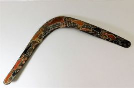 A naive painted boomerang 26.5in span
