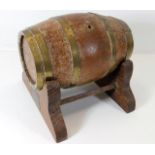 An early 20thC. small oak aging barrel 8.5in wide