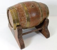 An early 20thC. small oak aging barrel 8.5in wide
