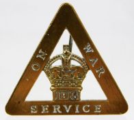 An On War Service badge no. 261897