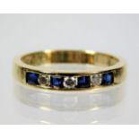A 14ct gold diamond & sapphire ring set with approx. 0.15ct diamond 2.6g size O