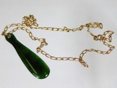 A 9ct gold necklace set with jade pendant 7.3g