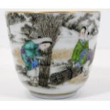 A finely painted Chinese porcelain cup with four c