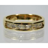 An 18ct gold ring set with 1ct diamonds size T/U 6