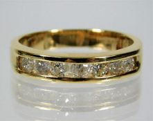 An 18ct gold ring set with 1ct diamonds size T/U 6