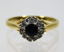 An 18ct gold sapphire & diamond ring 3.4g size M