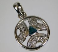 A 14ct gold pendant set with blue & white diamonds 3.2g