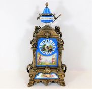 A 19thC. spelter clock with Sevres style panels 16