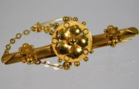 A 9ct gold brooch with floral design 2.8g