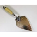 An engraved silver trowel inscribed Borough of Acc