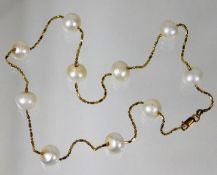 A 14ct gold necklace 12.3g with 9mm pearls
