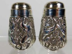 A pair of Anglo Indian salt & pepper pots marked '