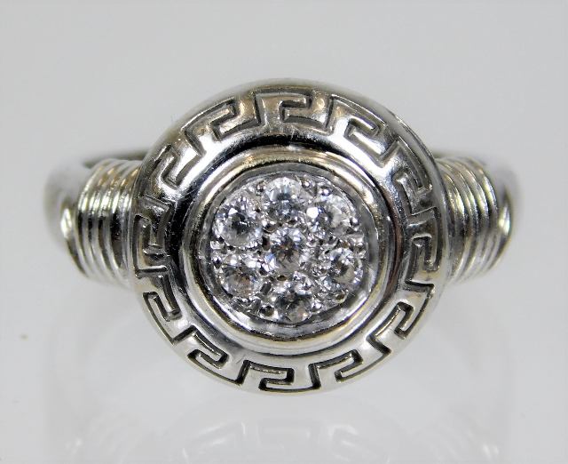 An 18ct white gold diamond Versace style ring 6g