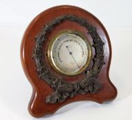 A c.1900 mahogany mounted Dalrymple barometer 5in