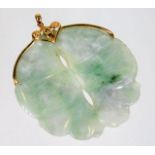 A 14ct gold mounted jade pendant 26.1g