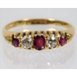 An 18ct gold ring set with diamond & ruby 3.5g siz