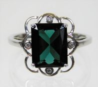 A 9ct white gold ring set with tourmaline & diamon