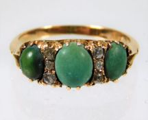 A yellow metal ring, tests as 18ct gold, set with natural turquoise & diamonds 3.3g size I/J