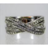 A 14ct white gold crossover ring set with 0.5ct di