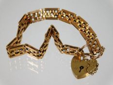A 15ct gold bracelet 13.5g with 9ct gold padlock c