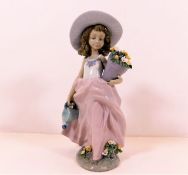 A Lladro figurine of girl with baby pattern no. 76